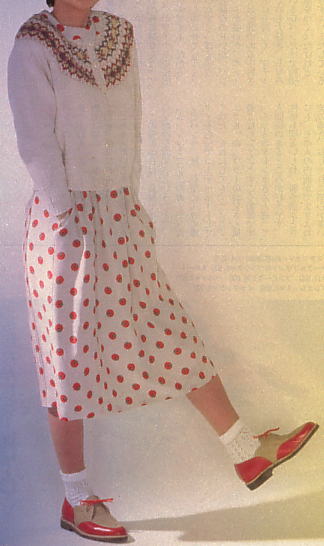 ���c�~�q����A�s���N�n�E�X�𒅂�